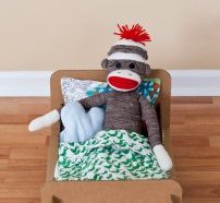 DIY cardboard doll bed | Cool Mom Picks