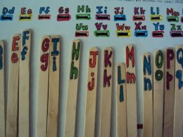 fine motor lettered craftsticks for drop activity