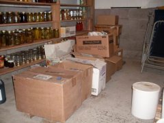 This is a very nice root cellar. It was designed with the total needs of the farm in mind, so has lots of room for canned goods, as well as fresh. The boxes in the center all contain beets, carrots, turnips, rutabagas, and potatoes.