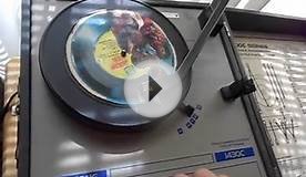 #227 - Playing a Cereal Box Cardboard Record