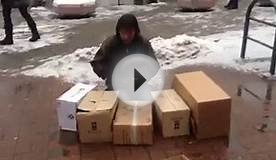 Beggar plays drums on cardboard boxes - Genuine Poor